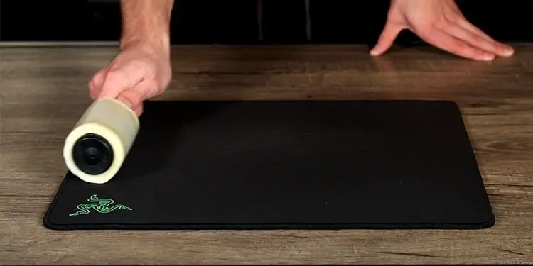 Why Is My Mouse Moving on Its Own? 9 Ways To Fix It 10 cleaning-the-mouse-pad