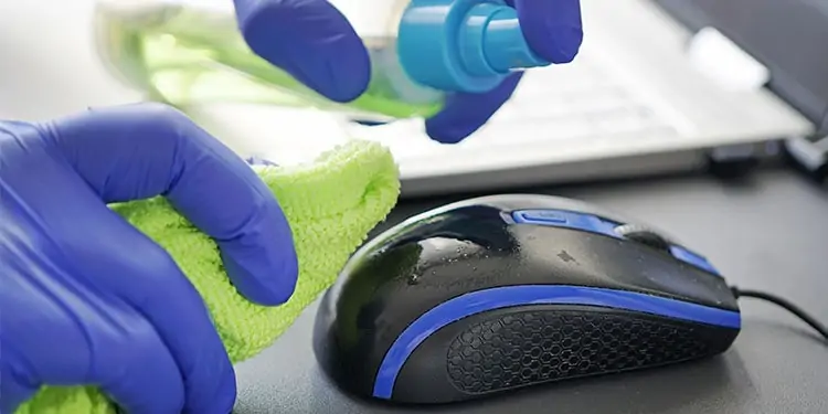 Why Is My Mouse Moving on Its Own? 9 Ways To Fix It 9 cleaning-the-mouse