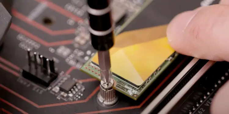 How to Use SSD as Boot Drive? 7 screwing-SSD-to-motherboard