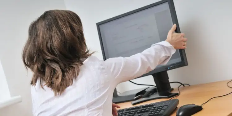 How Far Should You Sit From Your Monitor? 2 adjust-monitor-position