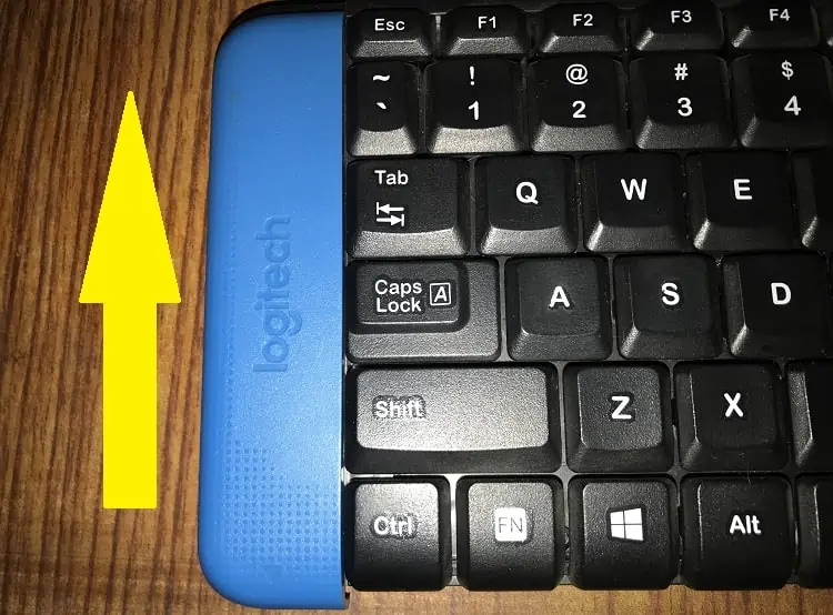How to Pair Logitech Keyboard (Beginner's Guide) 17 closing-battery-cover
