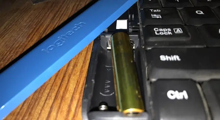 How to Pair Logitech Keyboard (Beginner's Guide) 15 insert-batteries-right-way
