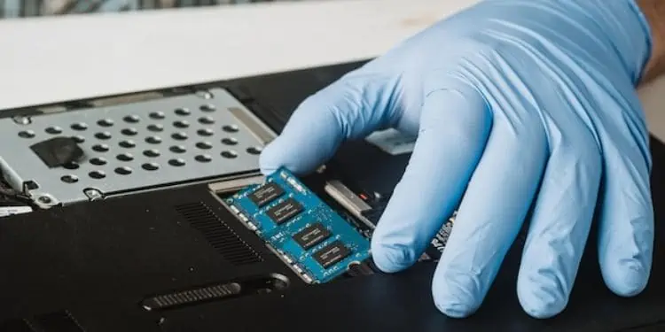 9 Things to Do After Installing a New RAM 15 laptop-align-the-ridge-and-the-notch-of-the-RAM-chip