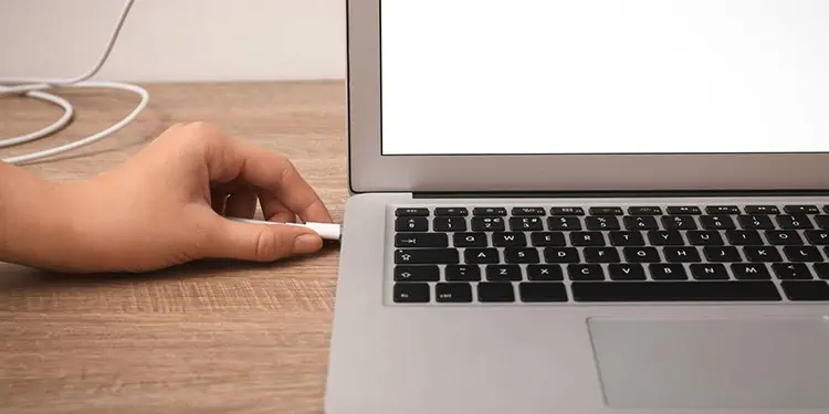Speakers Making Static Noise? Here are 7 Ways to Fix it 10 removing-charger