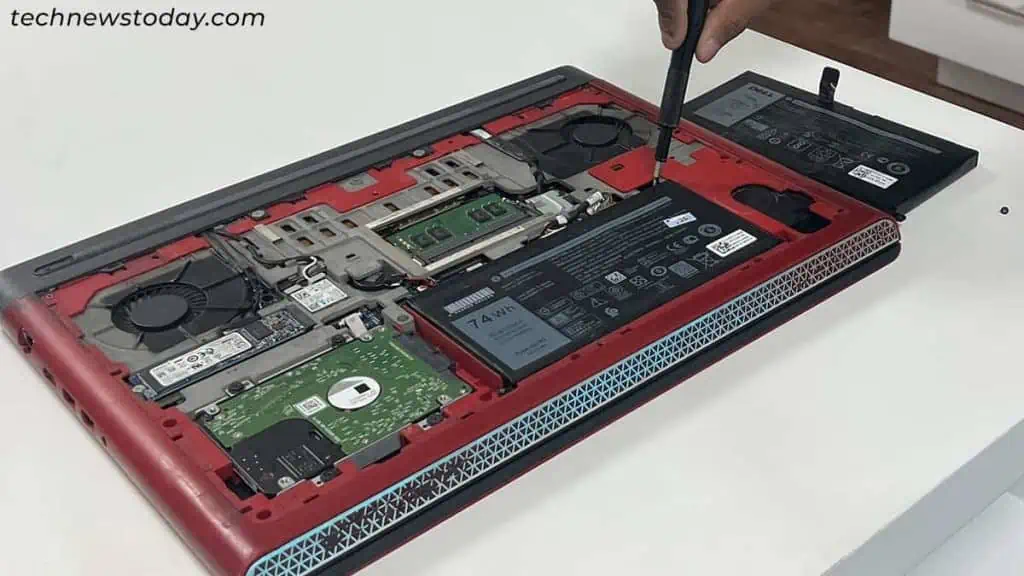 Why is My Laptop Battery Swelling? How Can I Fix It 4 replace-with-new-battery-1024x576