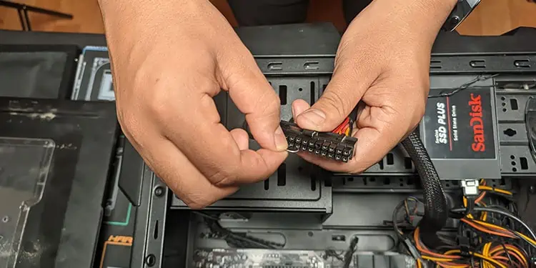 Insert-paperclip-into-the-16th-and-17th-pins