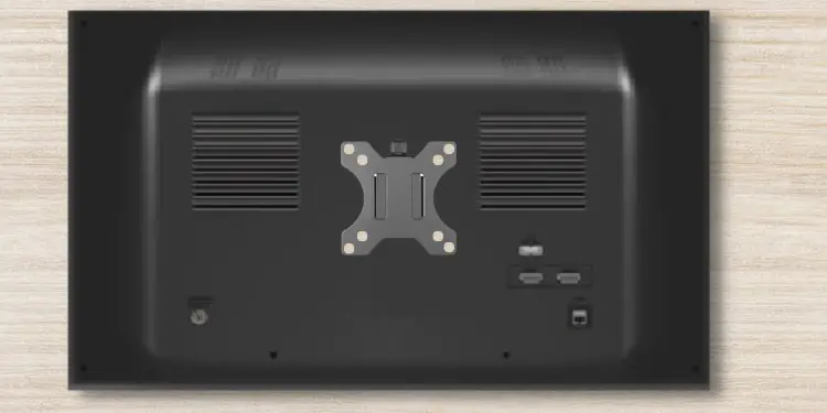 How to Mount a Monitor Without Holes 27 place-vesa-adapter-above-the-holes