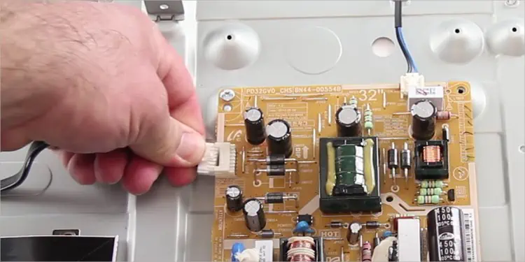 Samsung TV Red Light Blinking? Here’s How to Fix It 16 remove-cables-from-PSU-of-TV