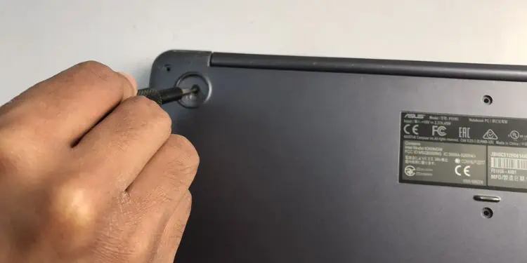 unscrew-each-screw-under-rubber-feet