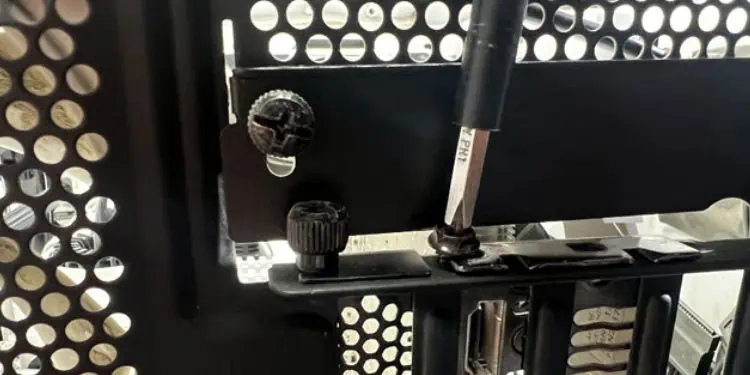 14 Ways to Fix Windows Boot Loop 64 untighten-screws-to-remove-graphics-card-from-the-slot