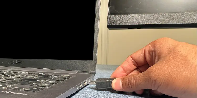 How to Connect Two Monitors to a Laptop (in 5 Steps) 5 insert-hdmi-in-laptop