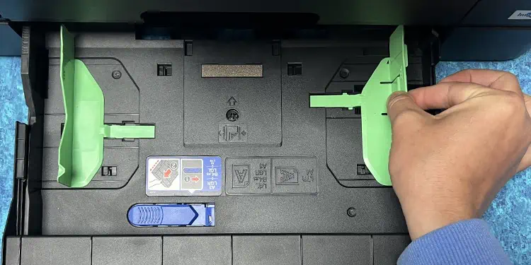 How to Put Paper in HP Printer 2 slide-the-paper-guides-in-front-tray