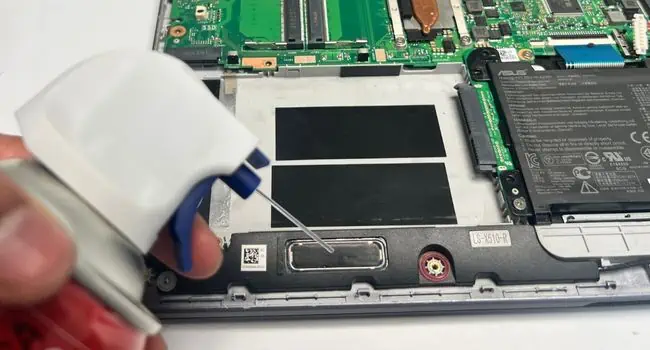 clean-laptop-speaker-with-compressed-air