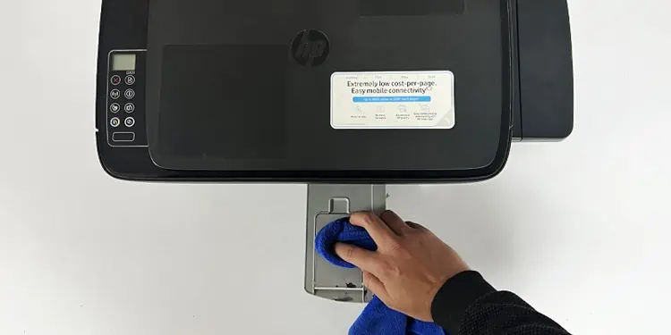 How to Clean a Printer (Complete Guide) 5 clean-output-tray-of-printer