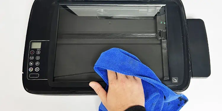 How to Clean a Printer (Complete Guide) 9 clean-the-scanner-glass