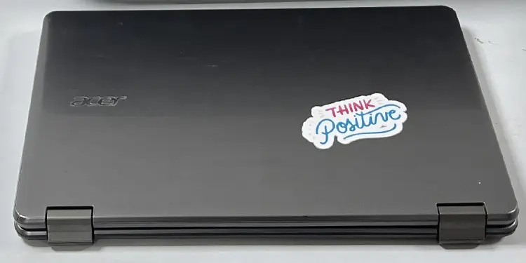 paste-sticker-in-laptop