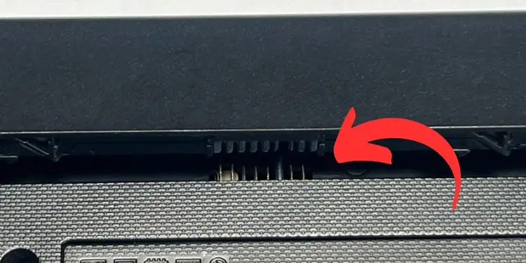 aligning-battery-pins-before-inserting