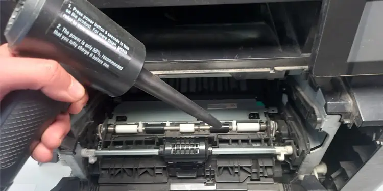 blow-dust-and-debris-out-of-printer