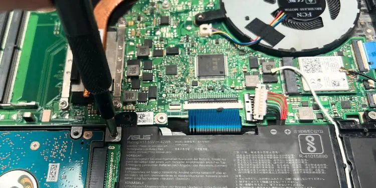 unscrew-the-screws-that-hold-the-integrated-battery-in-place