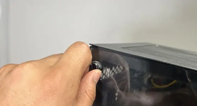 How to Reset BIOS on ASRock? 4 Effective Ways 12 untighten-pc-screw-to-open-case