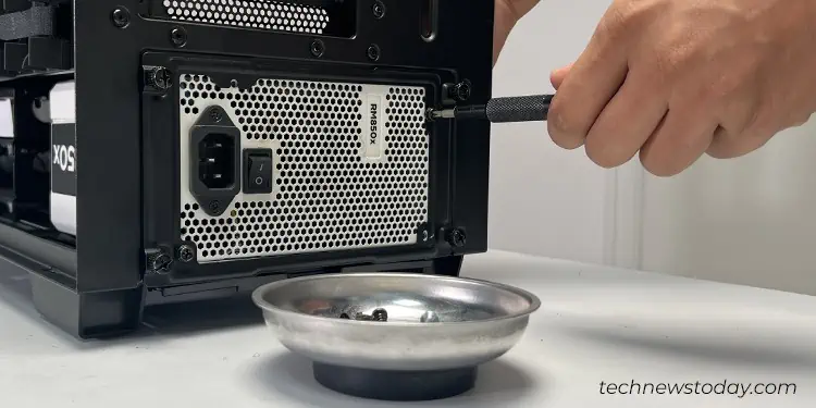 How to Install a Power Supply Unit in Your PC 8 tighten-the-PSU-screws