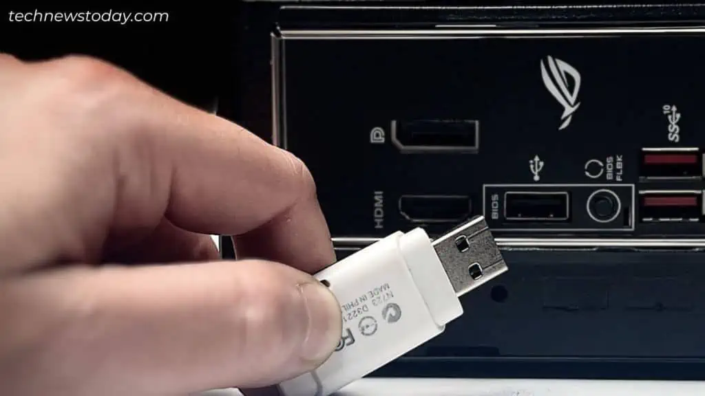 What is BIOS Flashback and How to Use It? 8 inserting-flash-drive-into-bios-port-1024x576