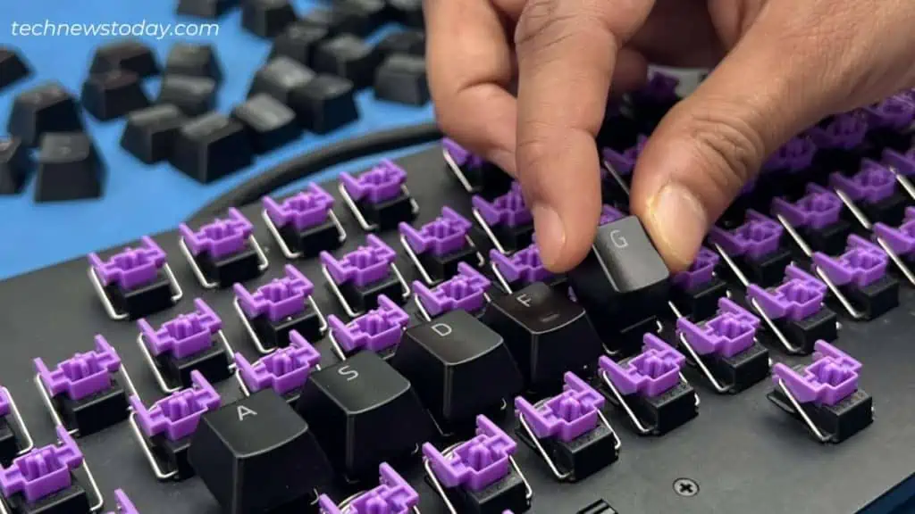 How to Clean Mechanical Keyboard in 7 Steps 23 reattaching-keys-razer-keyboard-1024x576