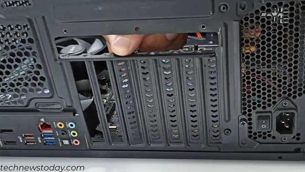 How to Connect GPU to the Motherboard in 6 Steps 12 removing-slot-cover-connect-gpu-to-motherboard-1024x576