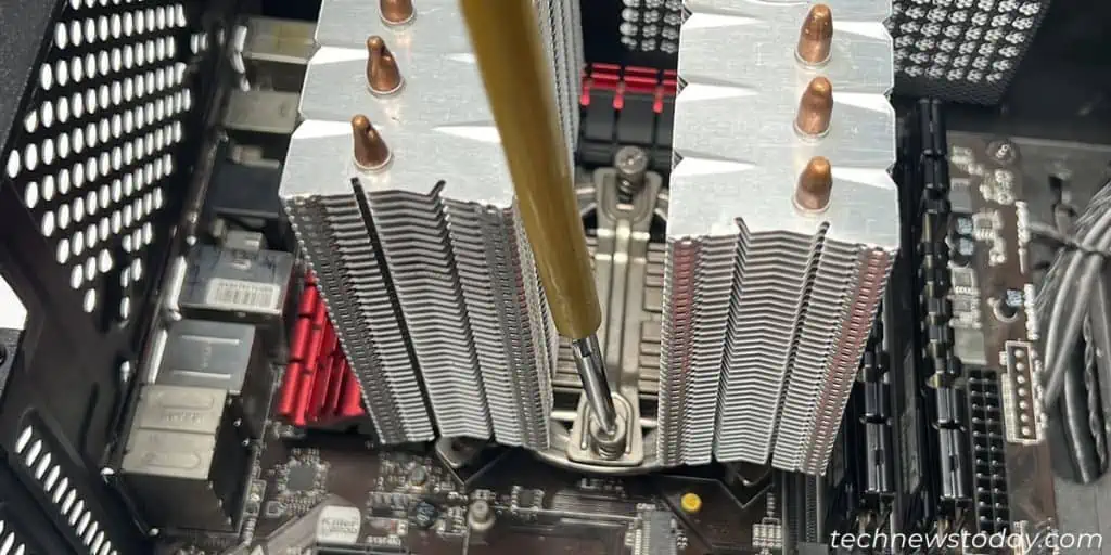 How to Remove a CPU Cooler from Motherboard The Right Way 7 unscrew-air-cooler-mounting-bracket-1-1024x512