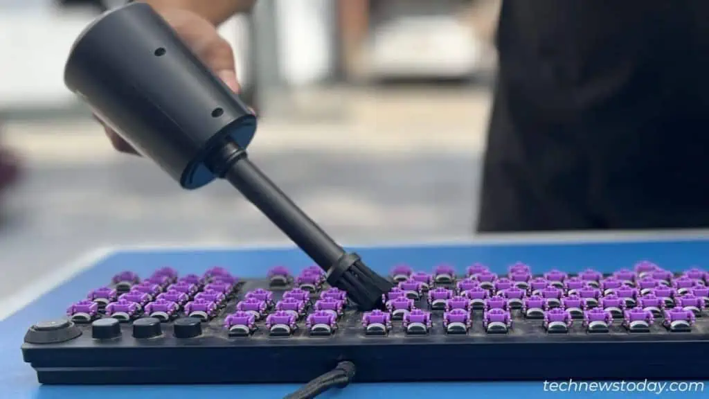 How to Clean Mechanical Keyboard in 7 Steps 8 using-air-duster-to-dust-off-particles-from-razer-keyboard-1024x576