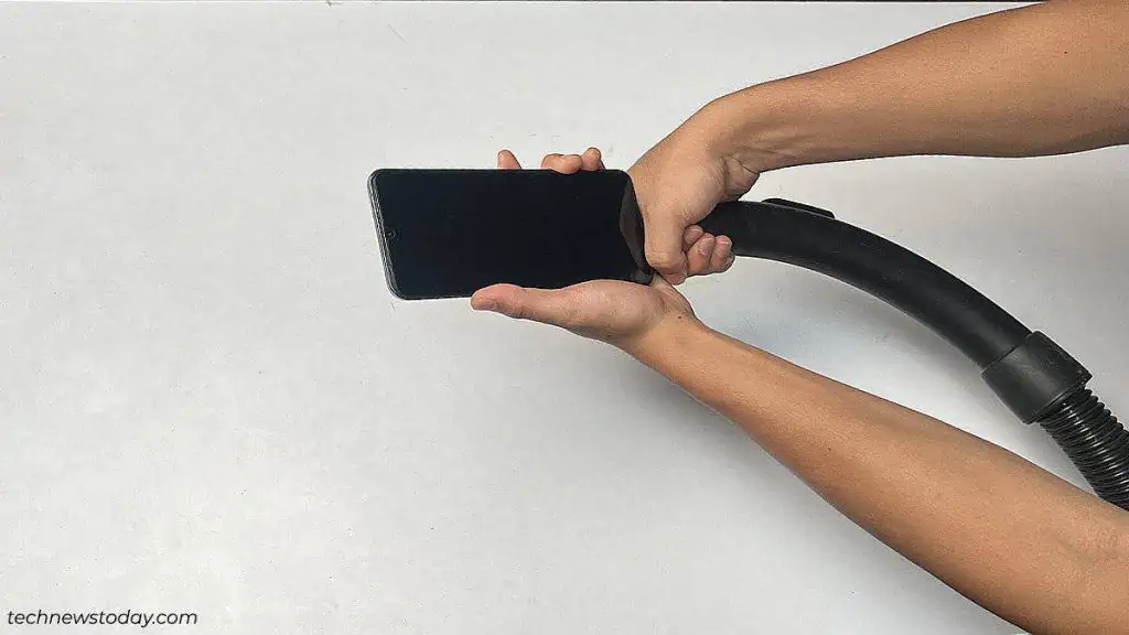 How to Get Water Out of Phone Speaker 7 vaccum-suction-to-get-water-out-of-phone-speaker-1-1024x576