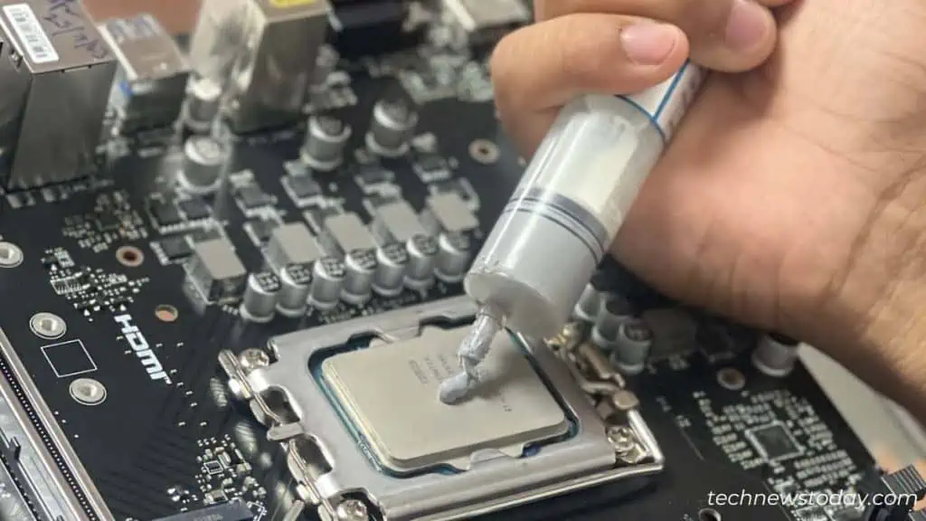 CPU Overheating For No Reason? Here is How to Fix It 6 reapply-thermal-paste-1024x576