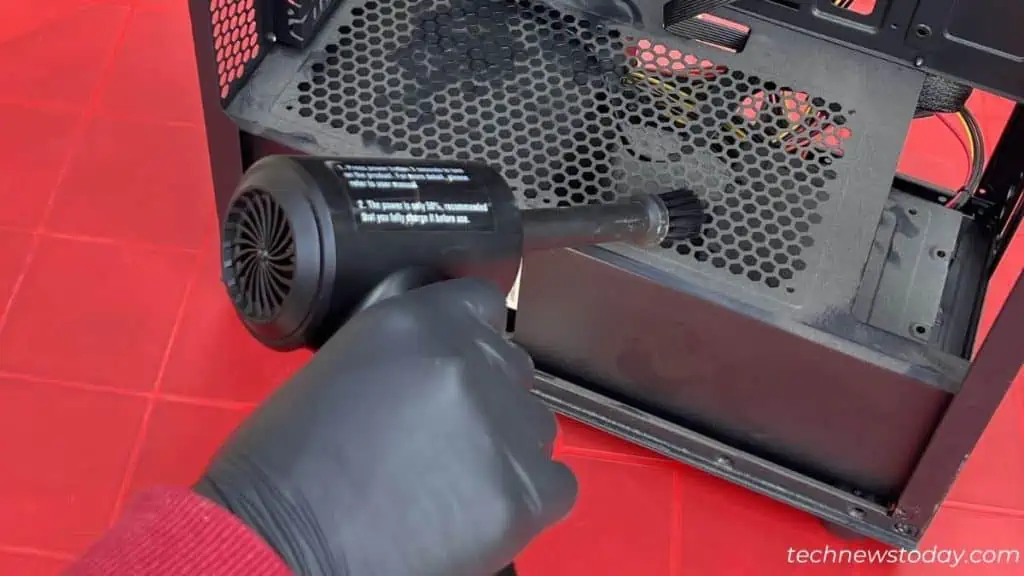 How to Clean Dust From PC 7 cleaning-dust-from-above-the-psu-shroud-1024x576