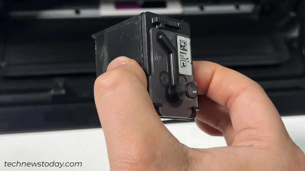 How to Change Ink in HP Printer? Step-by-Step Guide 7 hold-the-ink-cartridge-this-way-1024x576
