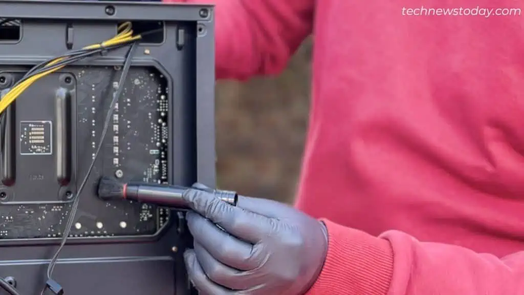 How to Clean Dust From PC 15 lightly-clean-the-motherboard-pcb-using-brush-1024x576