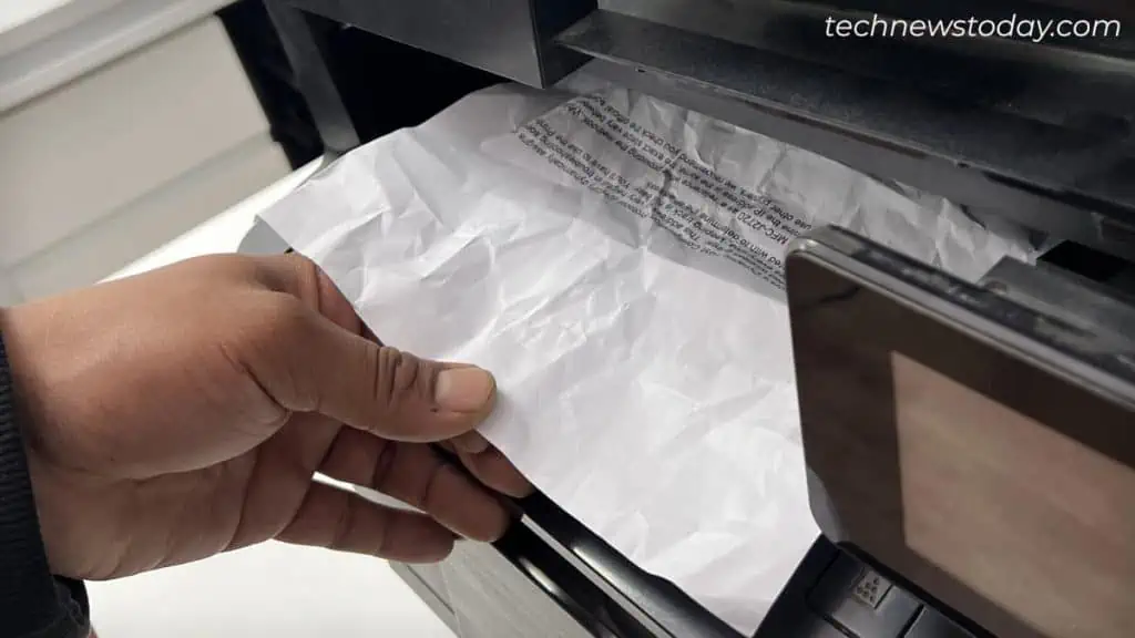 pull-out-scrap-papers-from-output-tray-hp-printer-1024x576