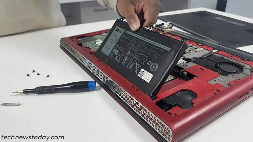 Why is My Laptop Battery Swelling? How Can I Fix It 3 remove-swelling-battery-from-laptop-1024x576