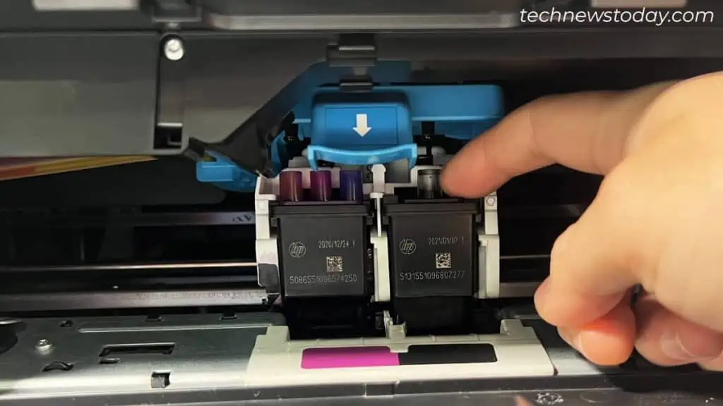How to Change Ink in HP Printer? Step-by-Step Guide 5 removing-cartridge-from-printer-1024x576