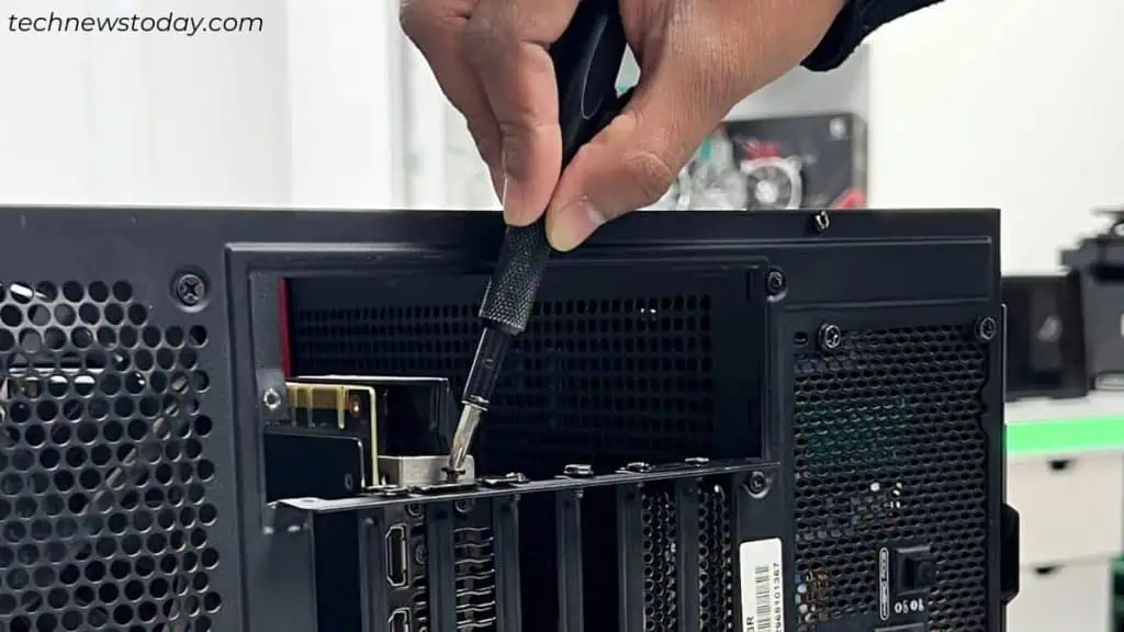 Does Your GPU Keep Crashing? Here's How to Fix It 2 tighten-the-graphics-card-with-a-screw-1024x576
