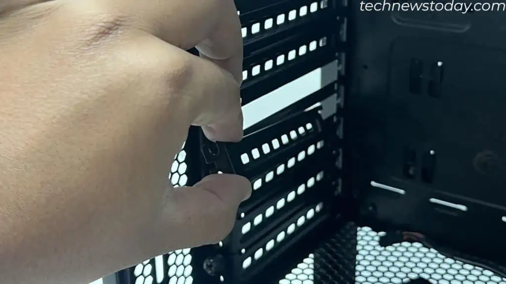 How to Remove PCIe Slot Bracket? 8 remove-pcie-slot-cover-with-screws-1024x576