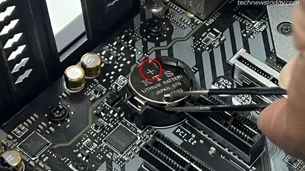 How to Remove CMOS Battery 6 making-sure-the-positive-sign-is-facing-up-during-cmos-installation-1024x576